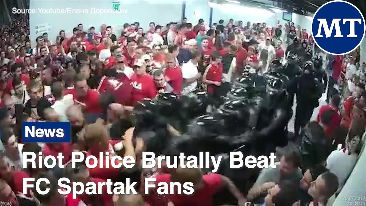 Riot Police Brutally Beat FC Spartak Fans  | The Moscow Times
