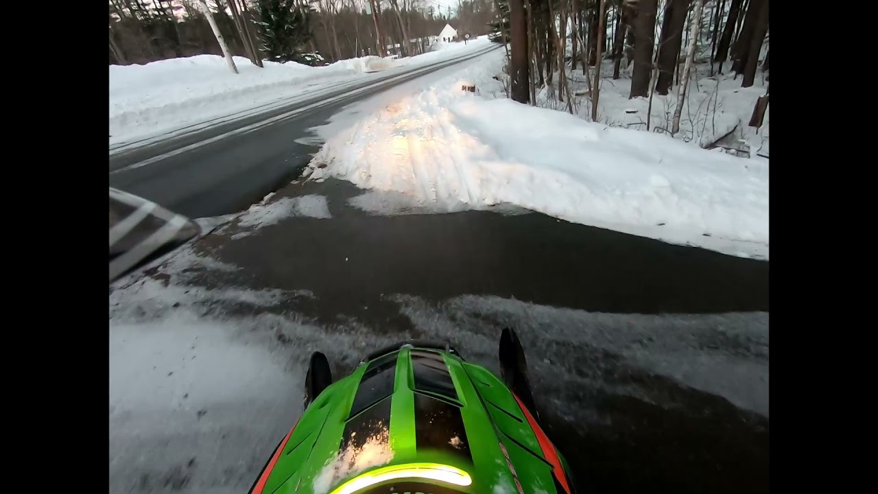 Snowmobiling to School