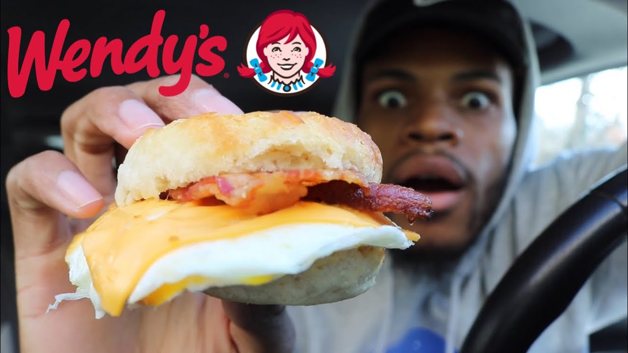 EATING WENDYS BACON EGG AND CHEESE BREAKFAST SANDWICH!