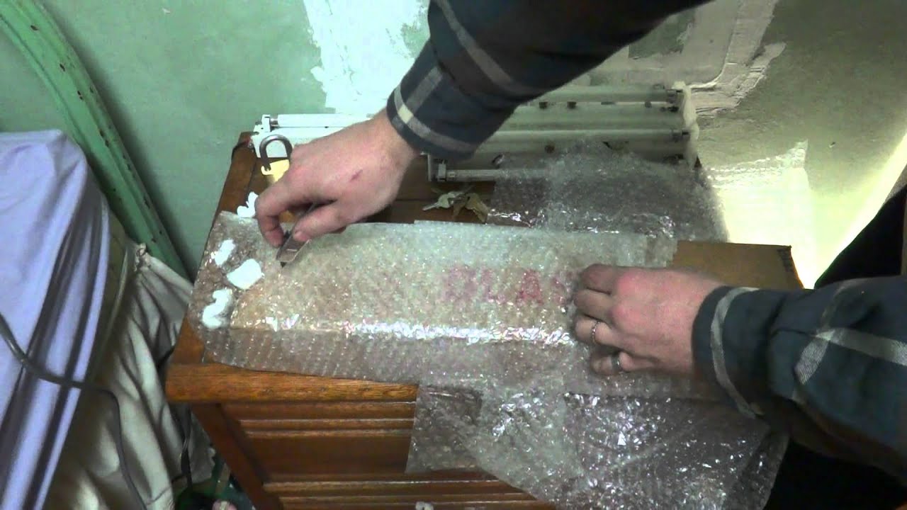 Unboxing a preheat fluorescent blacklight damaged during shipping