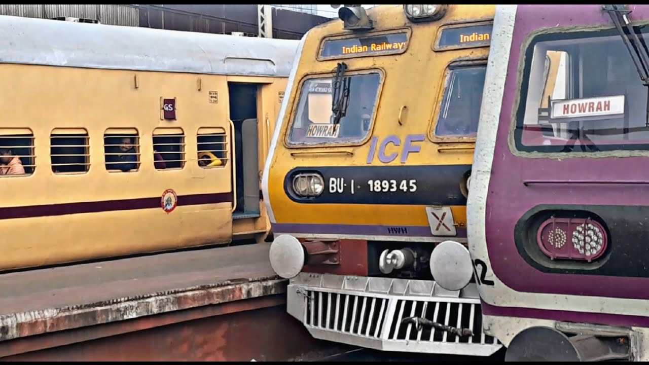 Pink and Yellow ICF Local Train at Howrah Mayurakshi Express. Howrah Bridge and Hooghly River.
