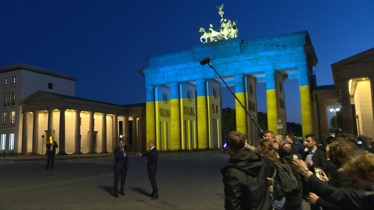 Macron, Scholz show Ukraine support at Brandenburg Gate | AFP