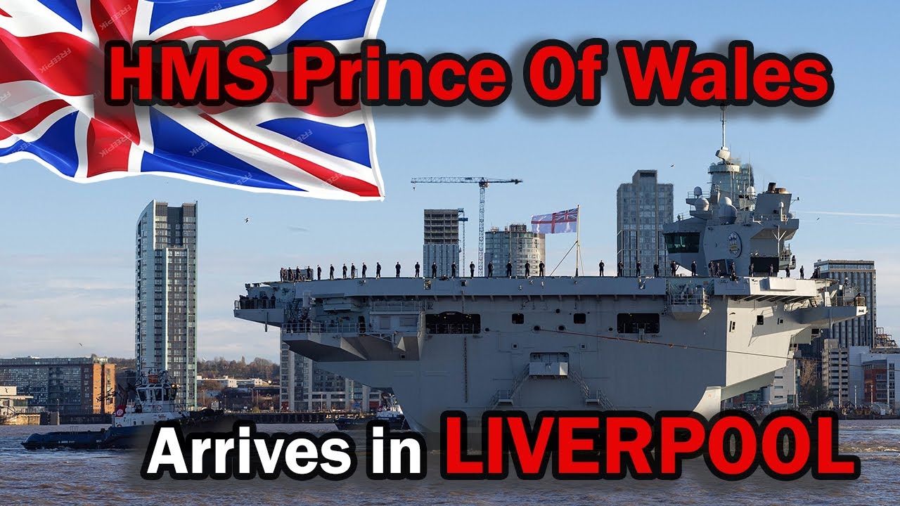 UK's Flagship 65,000 tonne 284 m Long Aircraft Carrier the HMS Prince Of Wales arrives in Liverpool