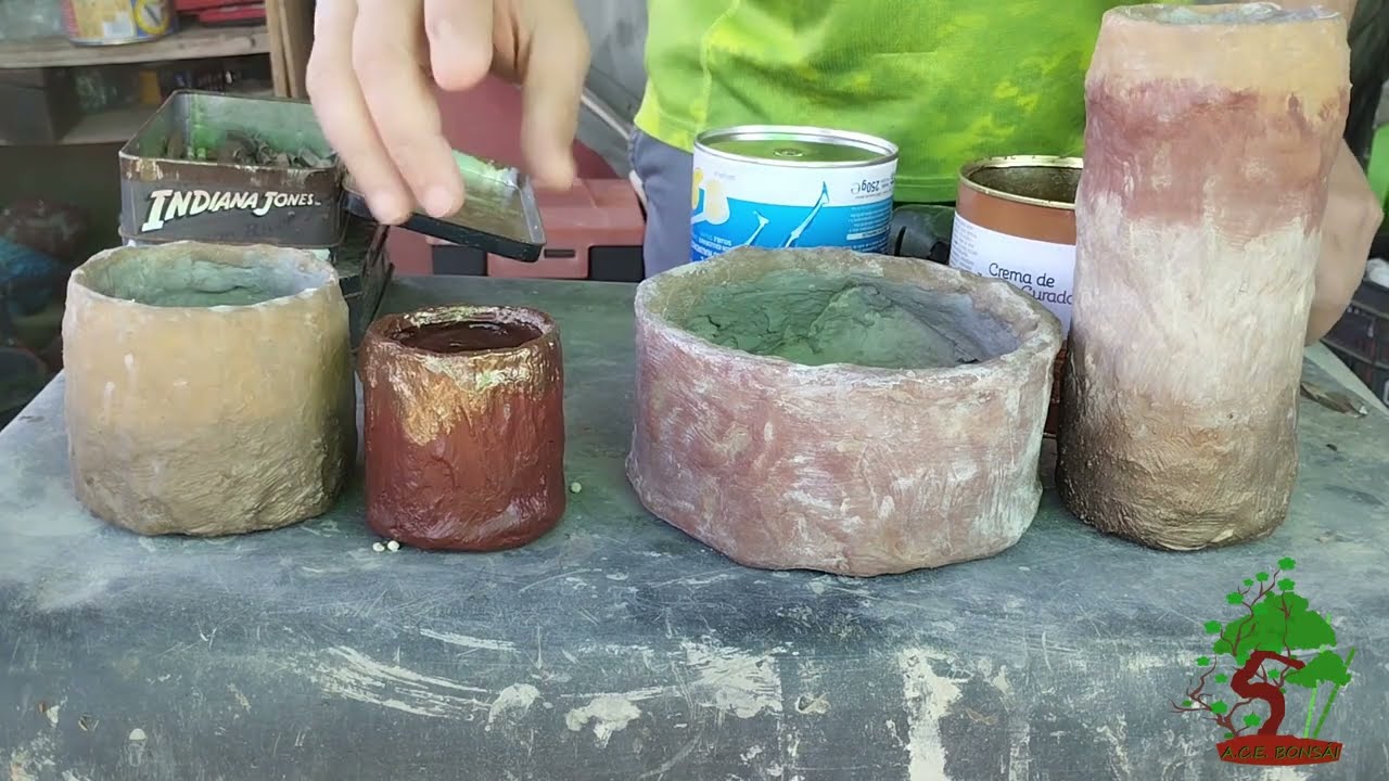 Macetas con botes reciclados