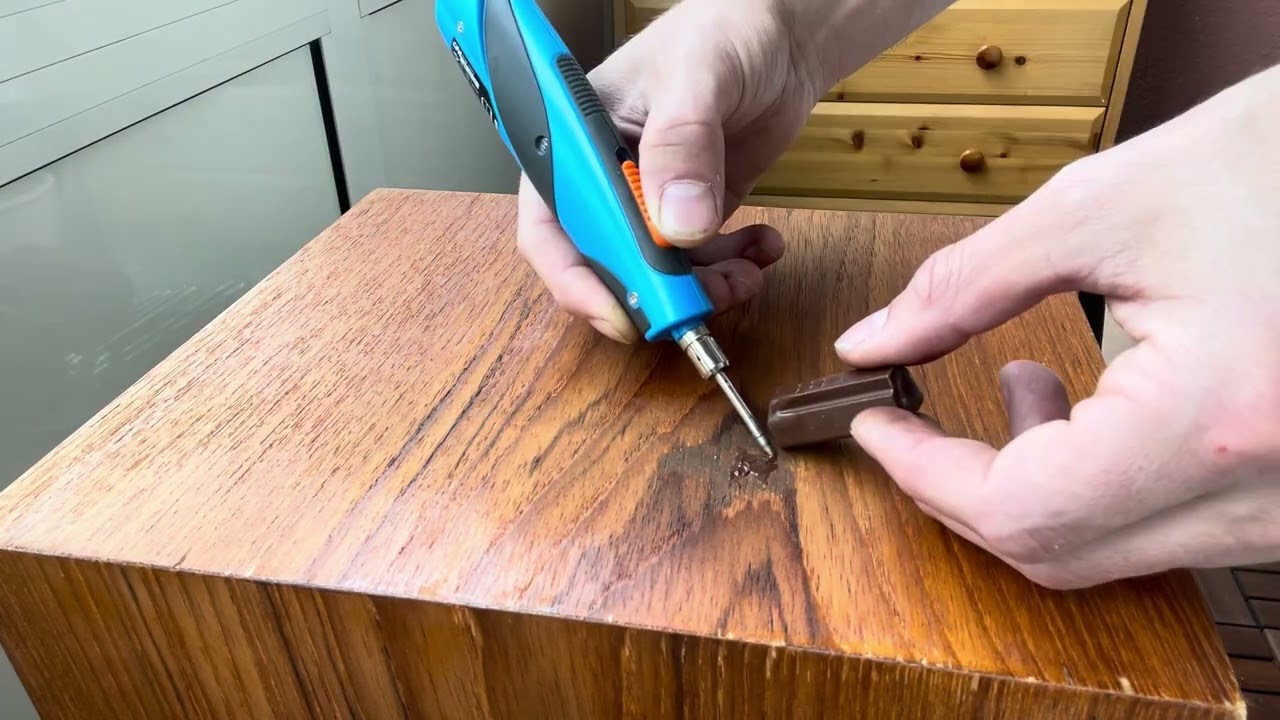 Repairing sanded through veneer