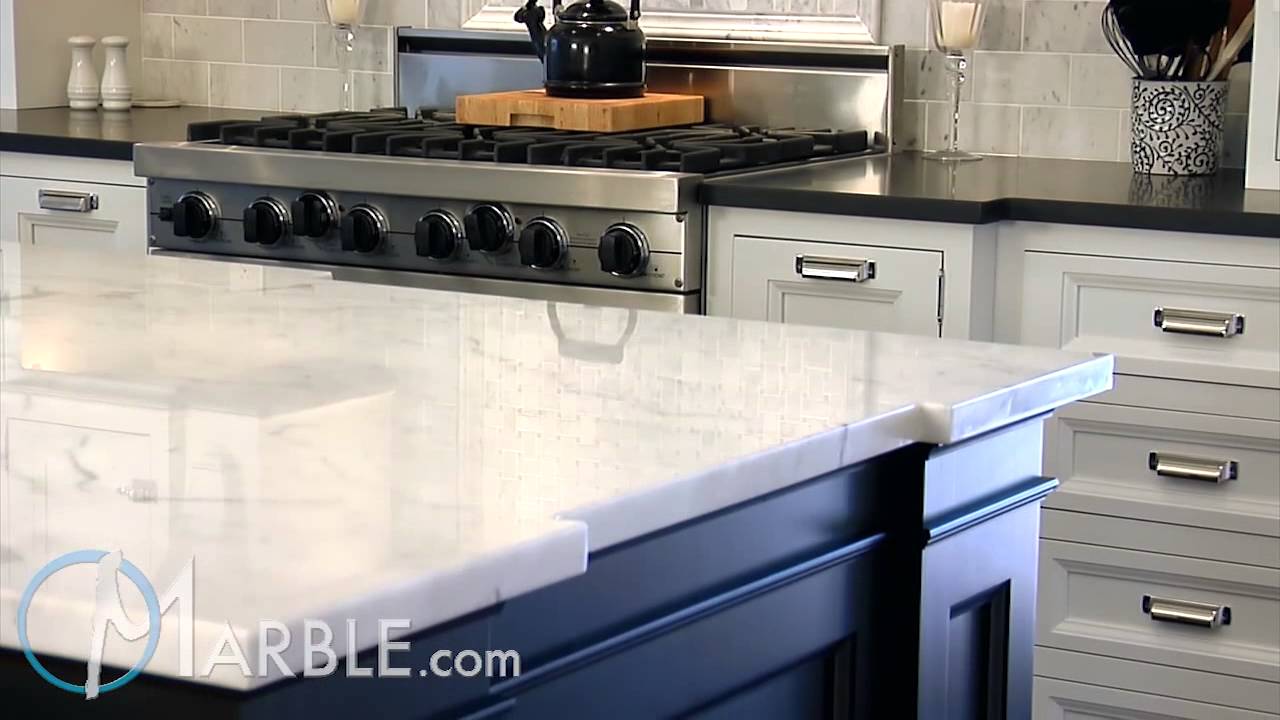 Statuarietto Marble and Absolute Black Granite Kitchen Countertops by Marble.com