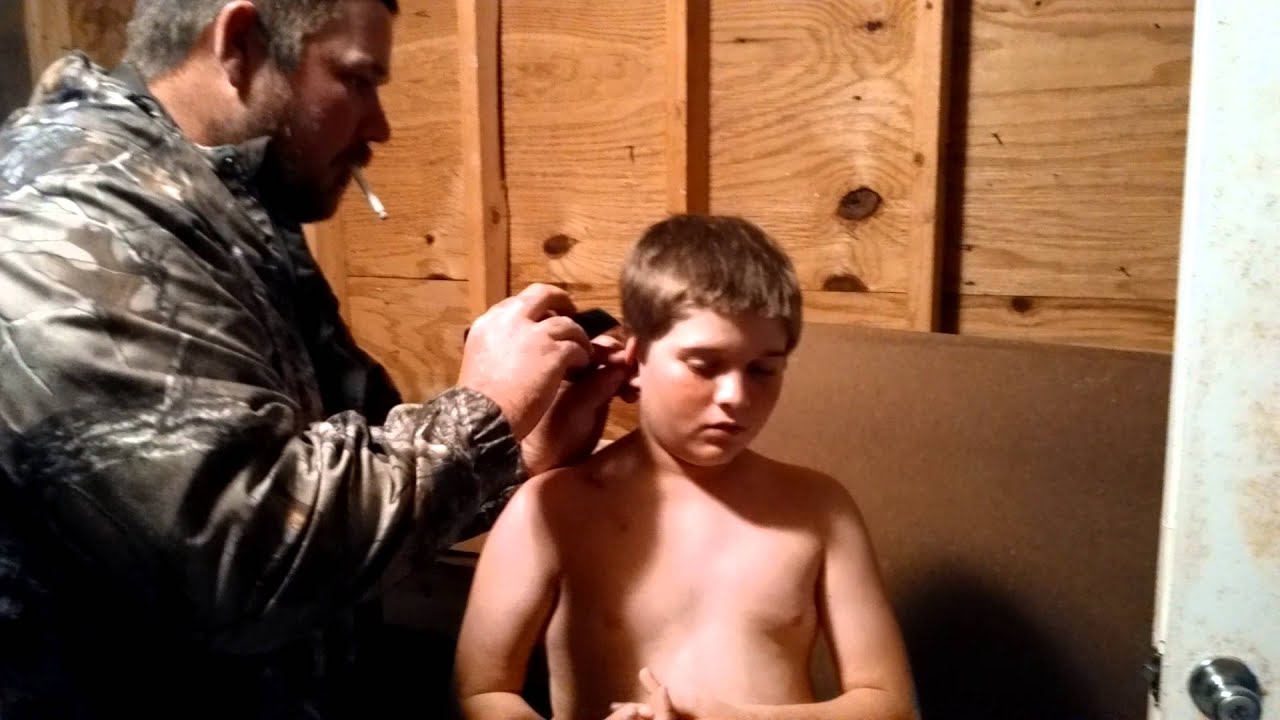 Giving little brother a hair cut