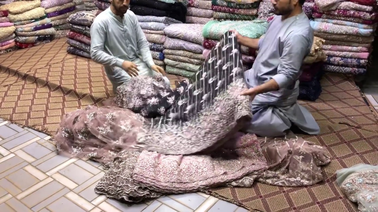 BRIDAL DRESS HANDWORK CUT DANA FABRICS