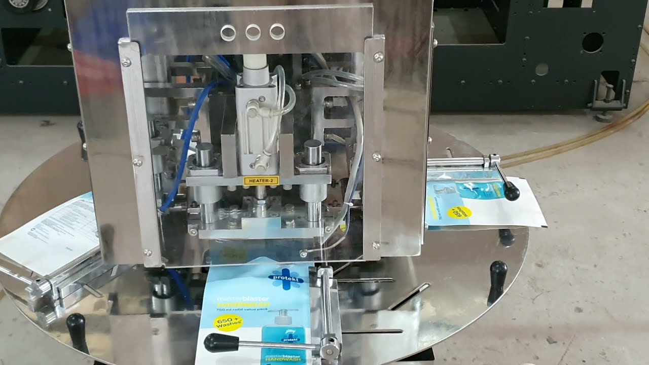 Semi Automatic Spout Sealing Machine Model : GSF-5X by Galaxy Packtech