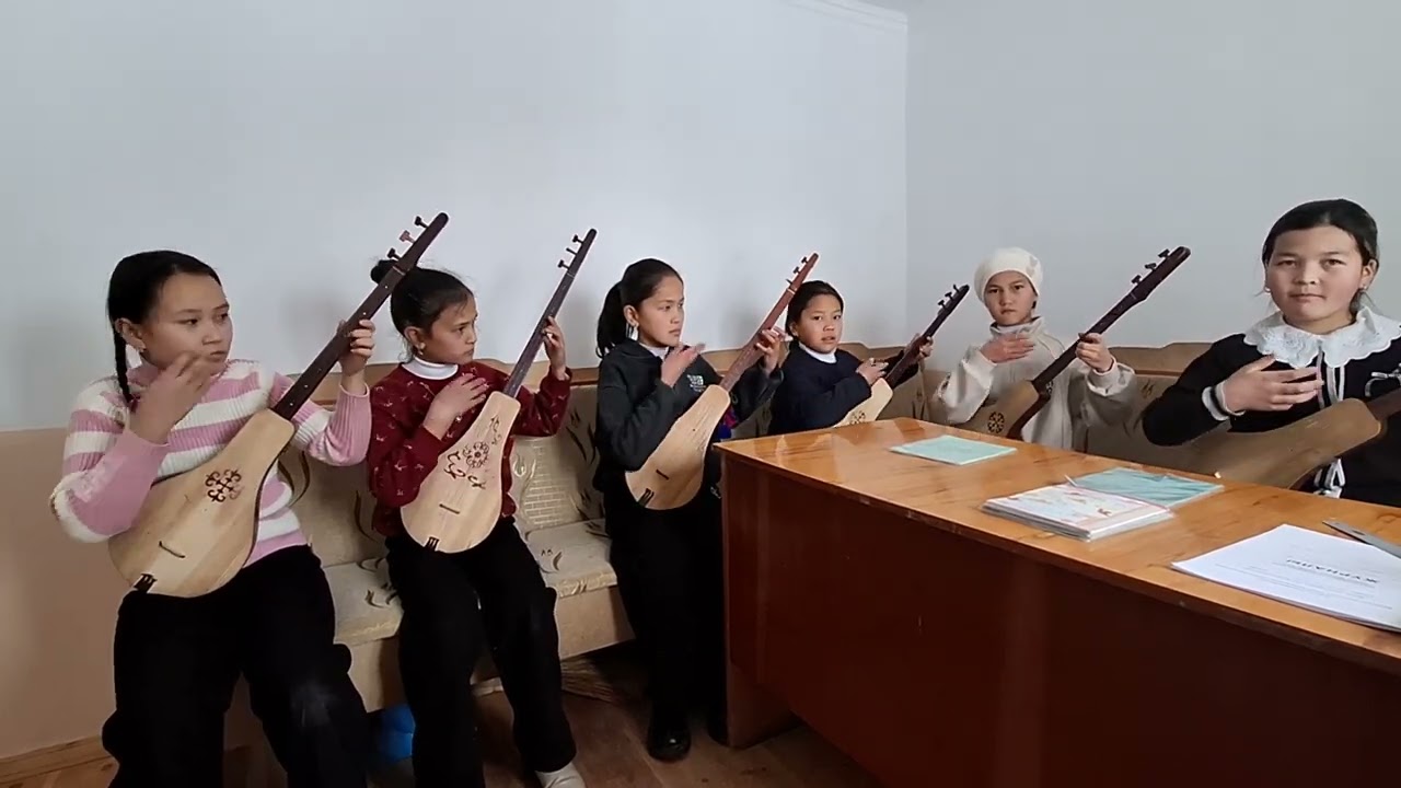 Комуз уйрону сабагы 