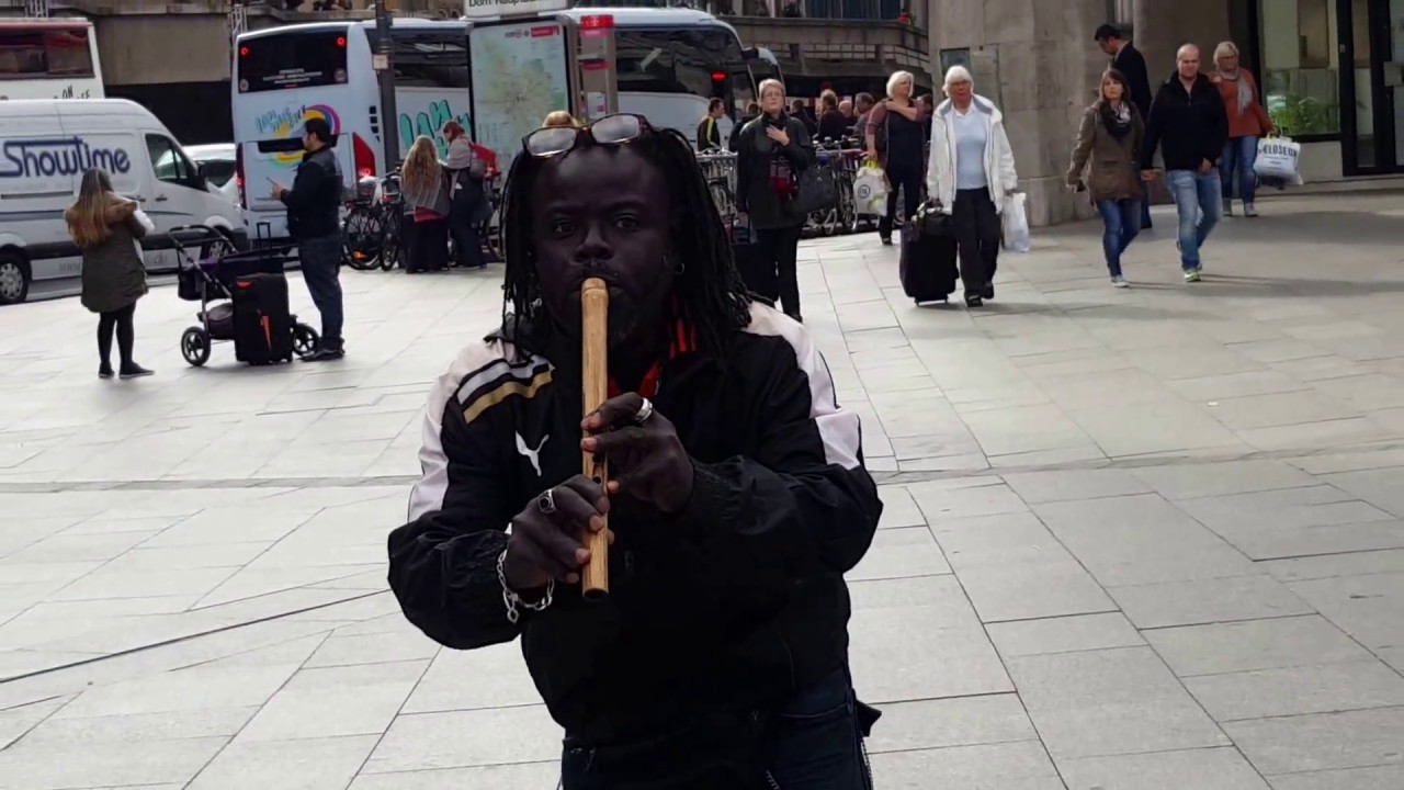 Flute played by African in koln Dom
