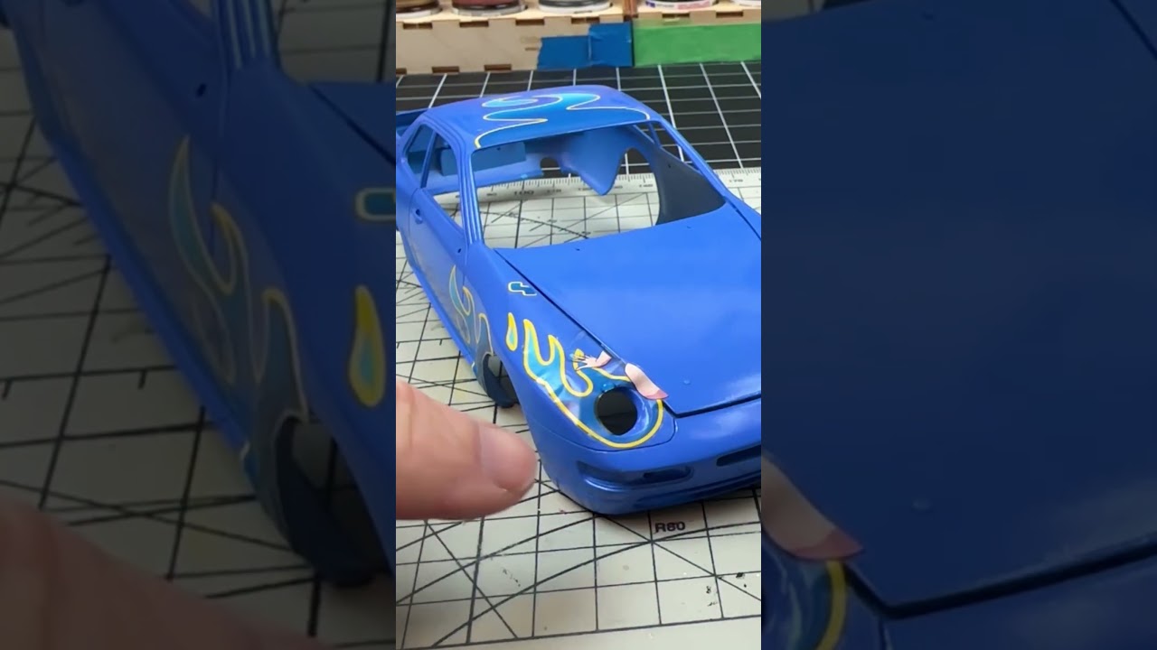 Adding decals to the #hasegawamodelkits Porsche 968 with Kaleido Azure Blue as the base coat.