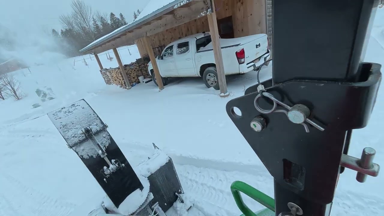 Snow blowing with John Deere 2032R and Woodmaxx SB-60