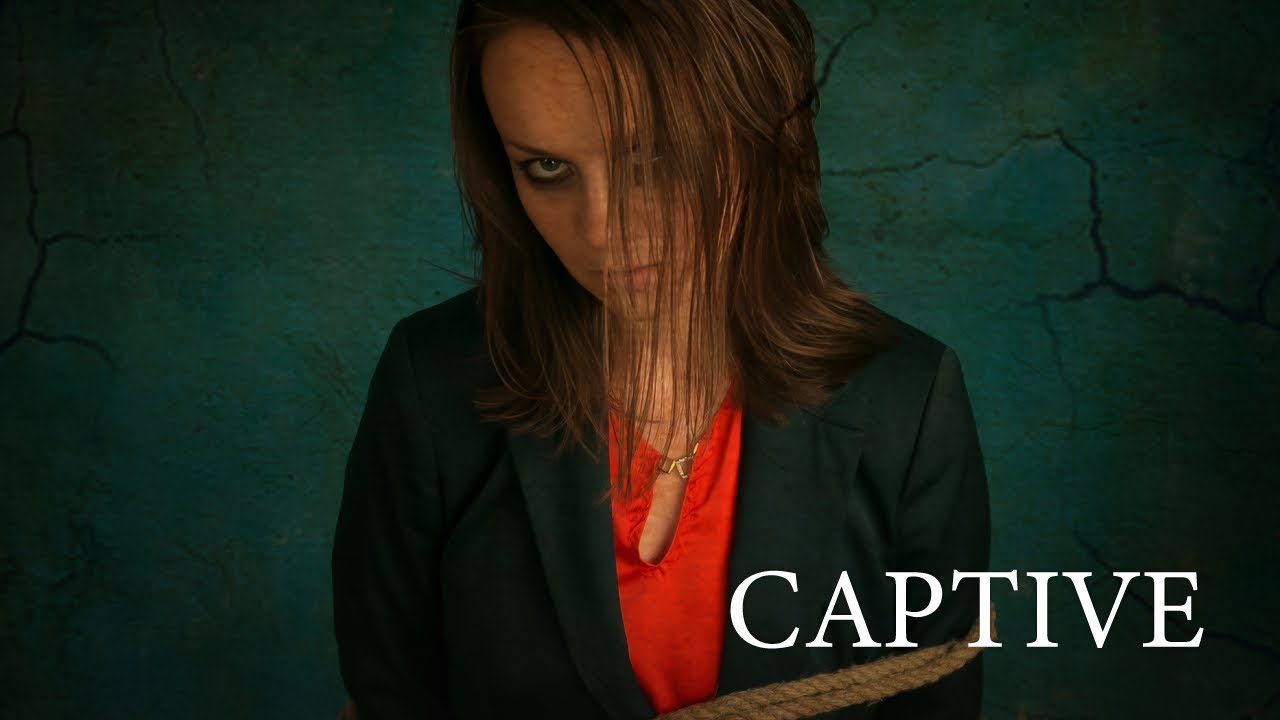 AN AMBITIOUS BUSINESSWOMAN IS ABDUCTED BY A SERIAL KILLER. CAPTIVE. THRILLER