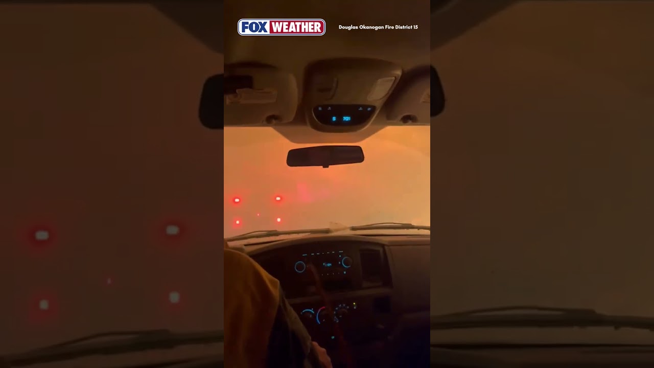 Washington firefighters drive through Sinlahekin fire
