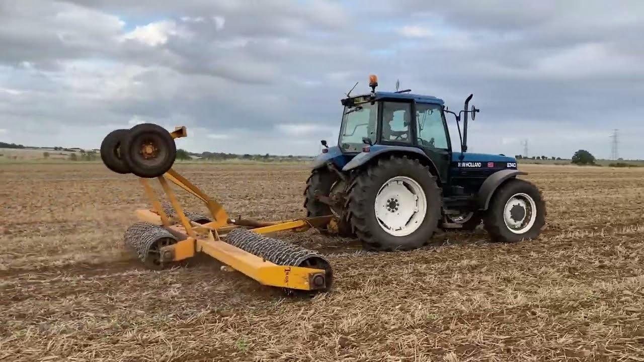 Ford New Holland 8340 Rolling Freshly Seeded Canola Field (Oil Seed Rape) - 2021
