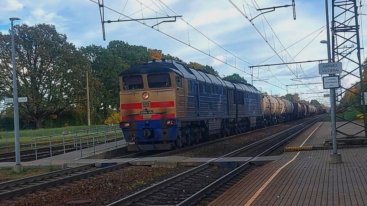 2TE116-1654 (Baltijas Ekspresis/BTS) with heavy loaded mixed freight train passing Skrīveri station 