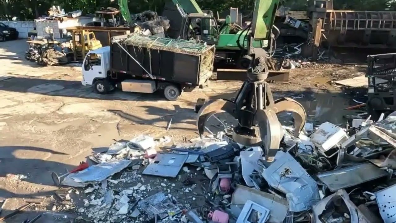 loading a full scrap truck