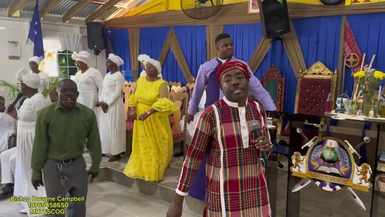 BISHOP LEWIS IN BISHOP DR. CAMPBELL THANKSGIVING 