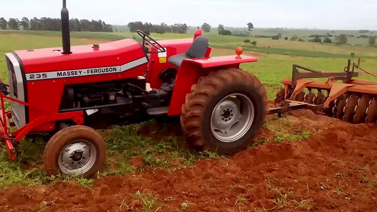Massey 235 com grade niveladora Baldan