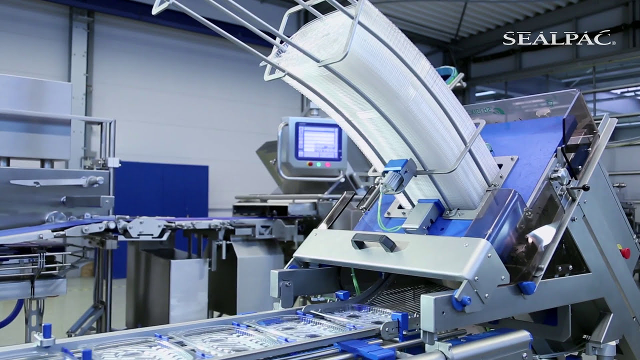 Traysealer automation at its best. SEALPAC A10 double lane sliced meat applications