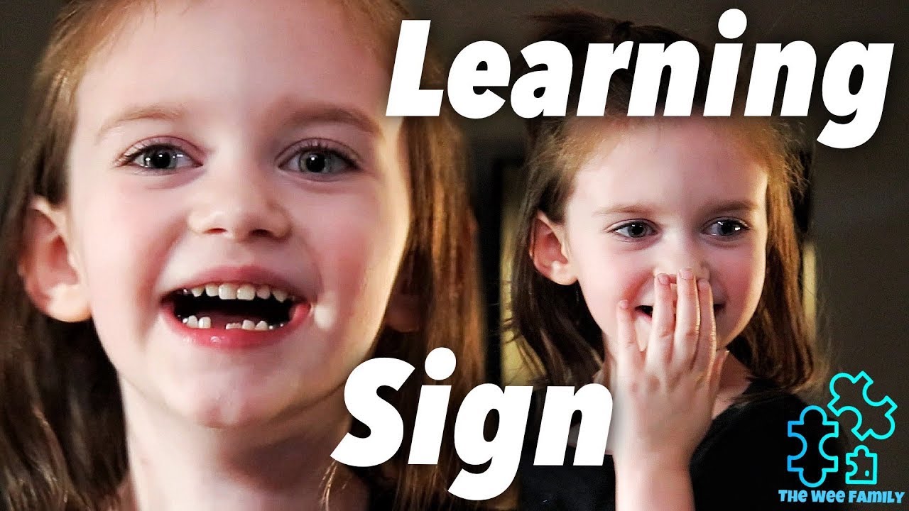 Nonverbal Girl Learning Sign Language 