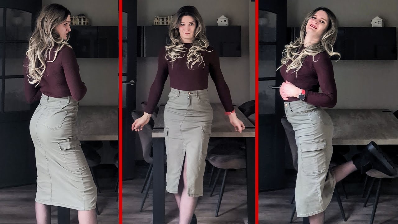 Crossdresser Laura in a figure hugging skirt.