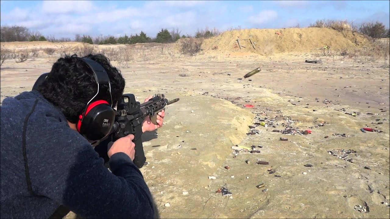 Friend's first time shooting full auto - HK23E and duty rifle M4 - Short video