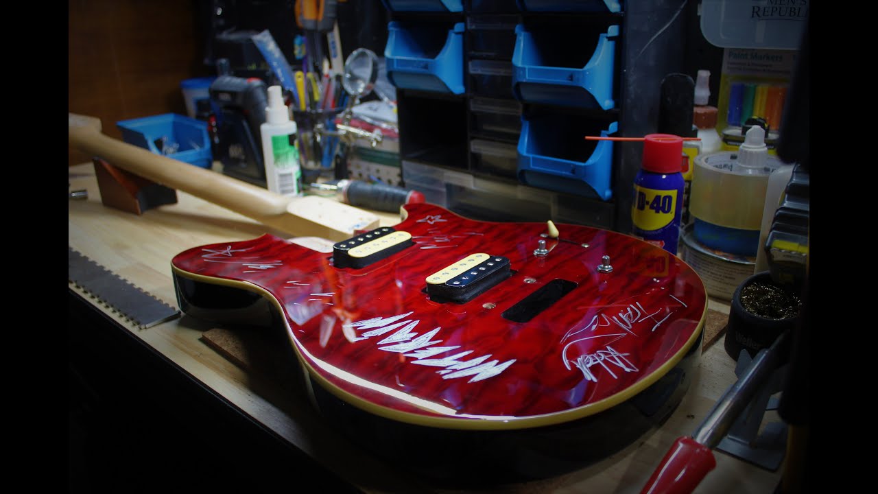 Cleaning and setting up a Sterling SUB AX3 Guitar