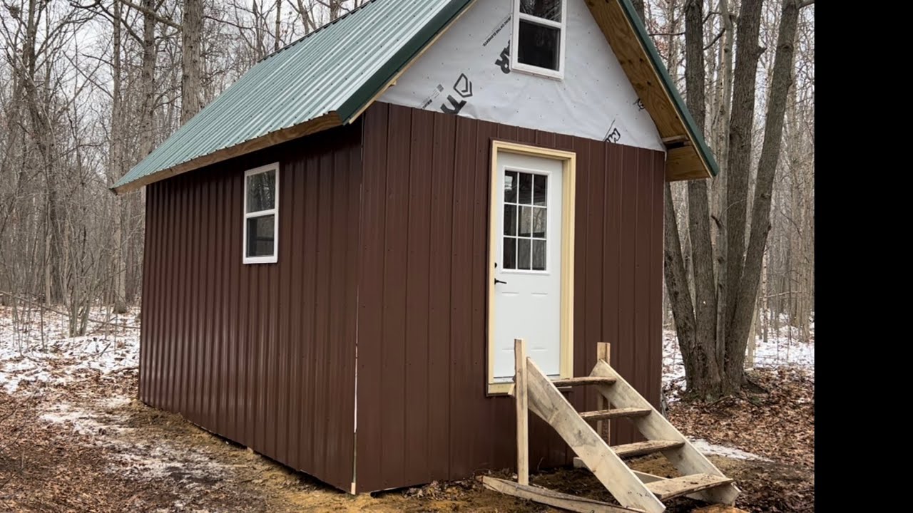 Off-Grid Cabin Build in the Woods - Part 5 - Roof and Siding Steel