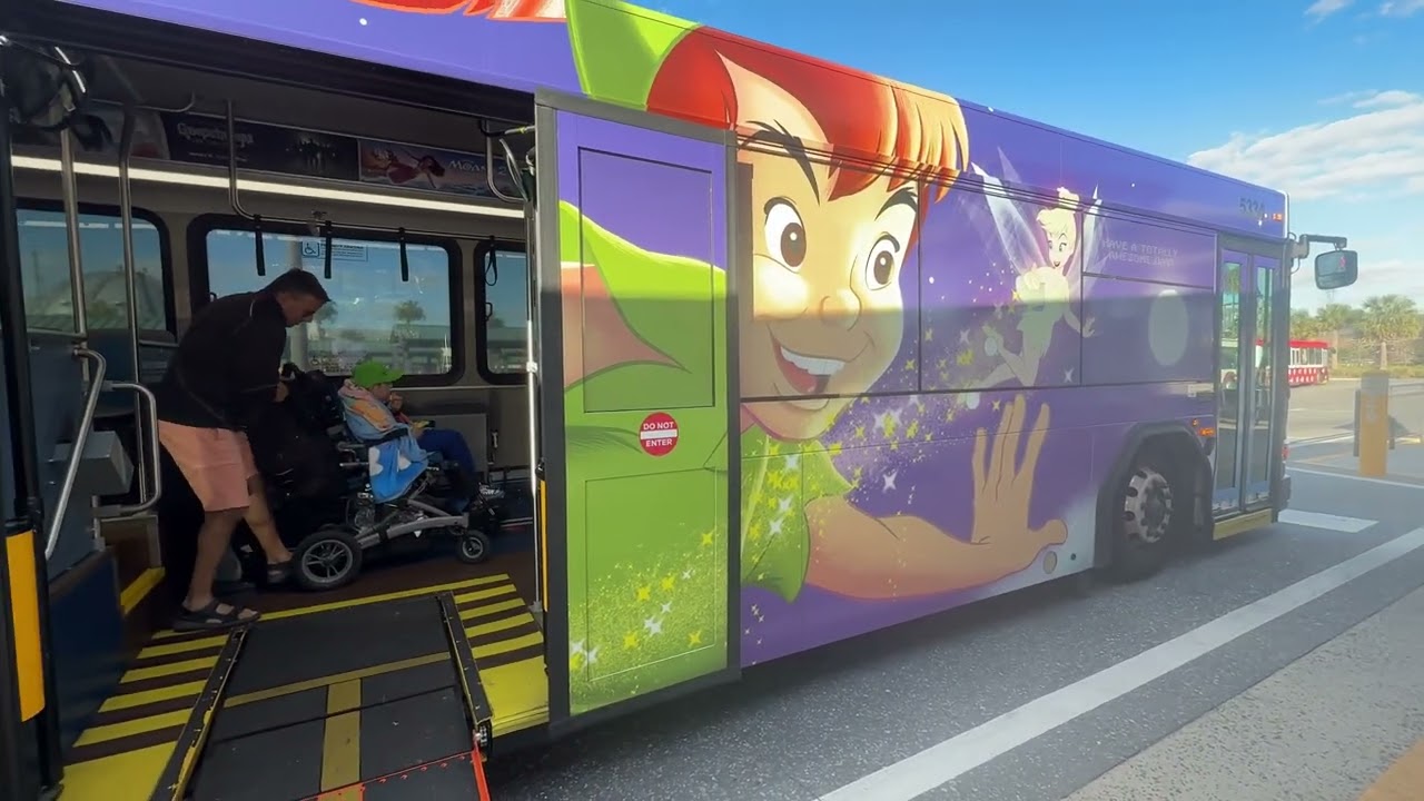 Kayden on Peter Pan Bus Ramp at Disney Springs and off at Pop Century Resort #bus #busstop #disney