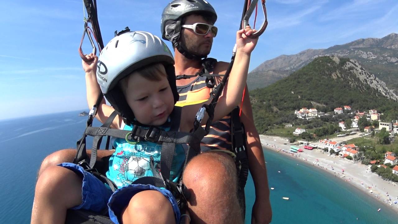 Paragliding kid 3 years old landing to Buljarica Montenegro