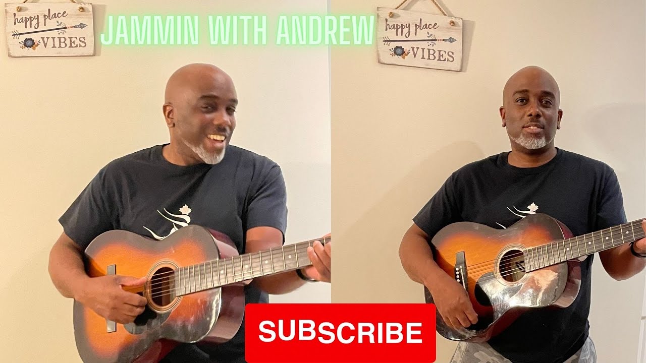 Jamaican dad on guitar, singing like Bob