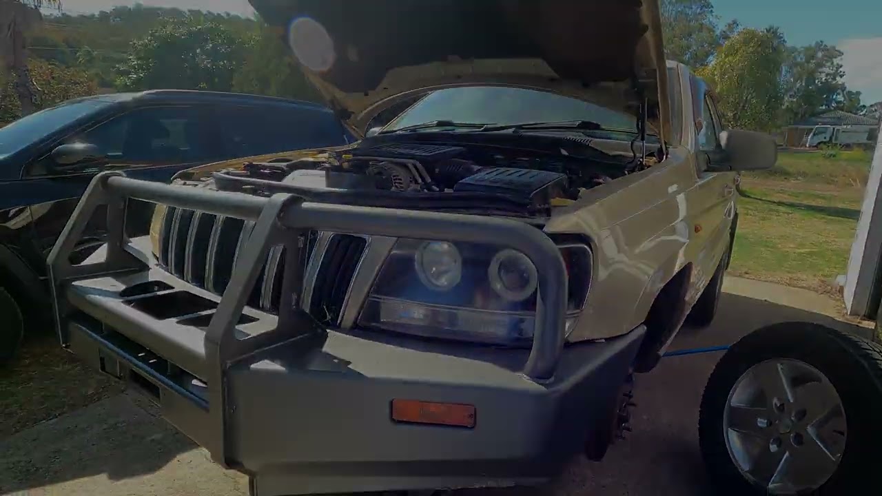 Coil install solid axle lift kit swap Big Dane WJ Grand Cherokee