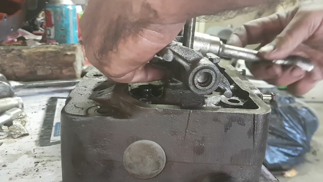 Partly disassemble MD7B part 5. Loosening up rockers. Do not do what I have done. But it worked.