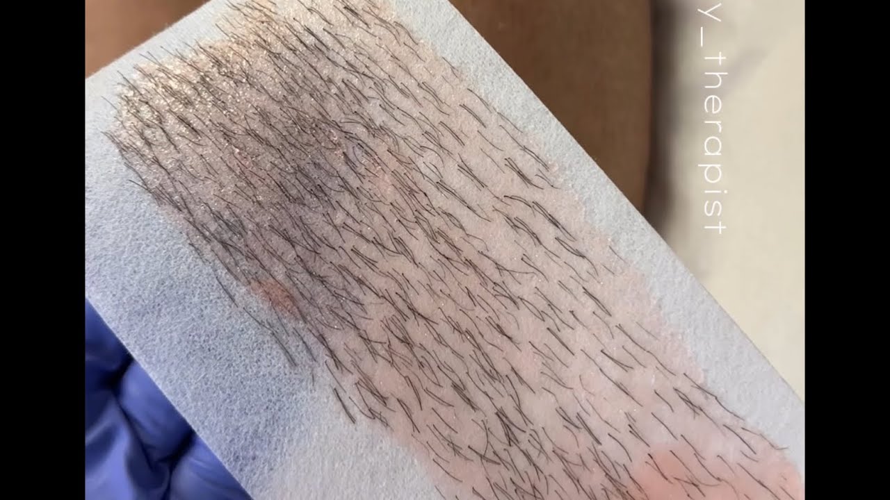 Lower leg wax service using Coral roll on soft wax cartridge and a professional heating system