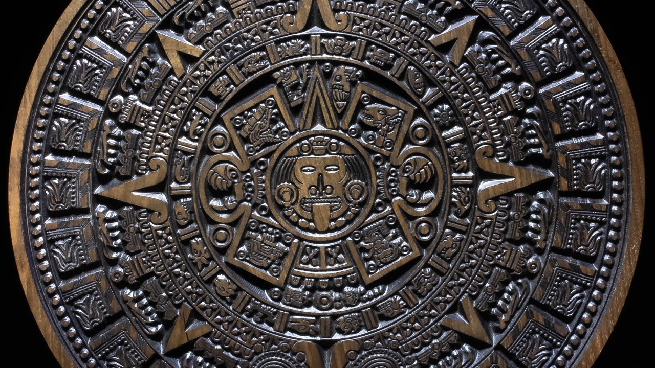 Wood carving - Aztec calendar and walnut