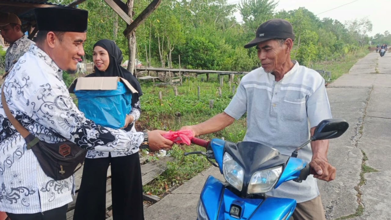 PGRI KECAMATAN KATEMAN BERBAGI TAKJIL