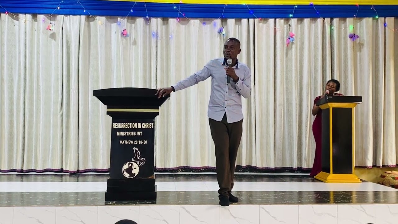 Pastor Henry preaching 
