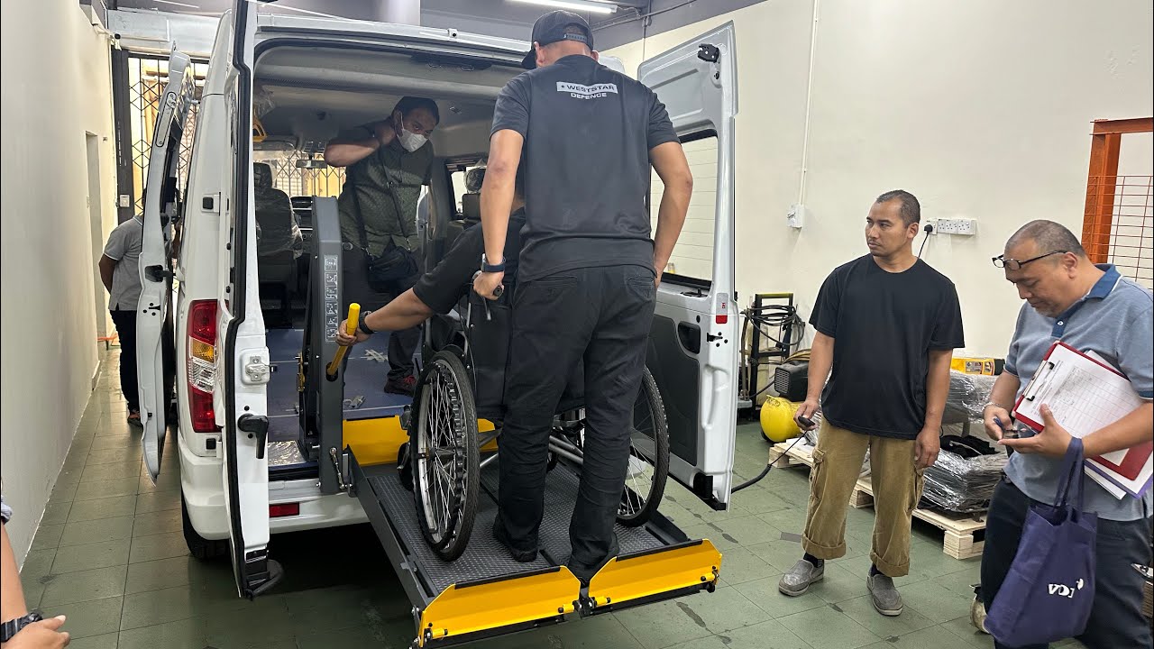 Kodo Hydraulic Wheelchair Lift installed in Mexus V80