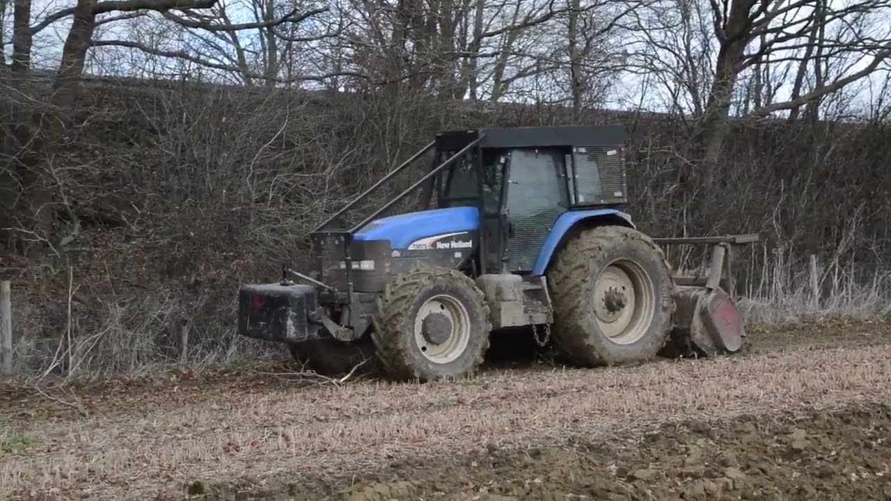 New Holland TM175 & Mulcher Mulching up branches