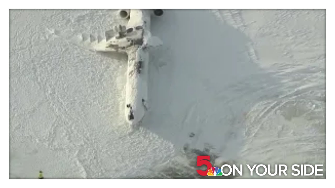 Aftermath of Delta Air Lines regional jet crash in Toronto on Tuesday