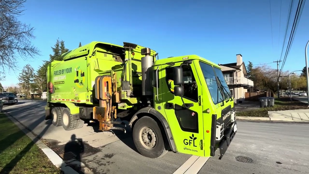 GFL Mack LR Labrie Automizer packing heavy post x-mas trash
