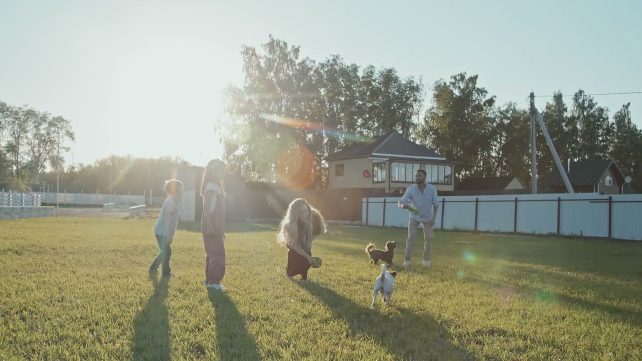Family Playing With Dogs In Backyard 4k