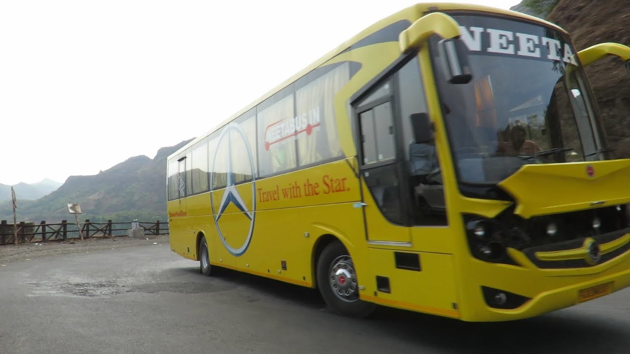 GAGANBAWDA GHAT:YELLOW NEETA BHARAT BENZ BUS DRIVING AT GHAT SECTION BEND ROADS