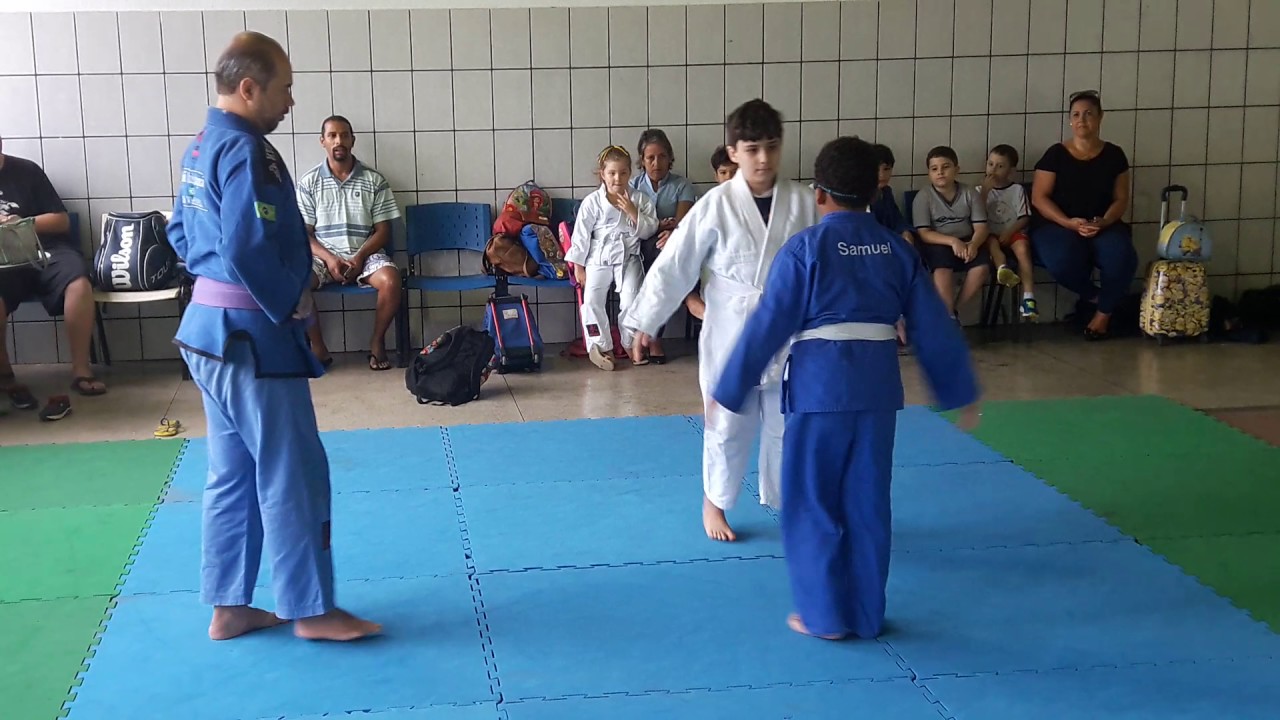 Samuel exame troca de faixa branca para azul Judo