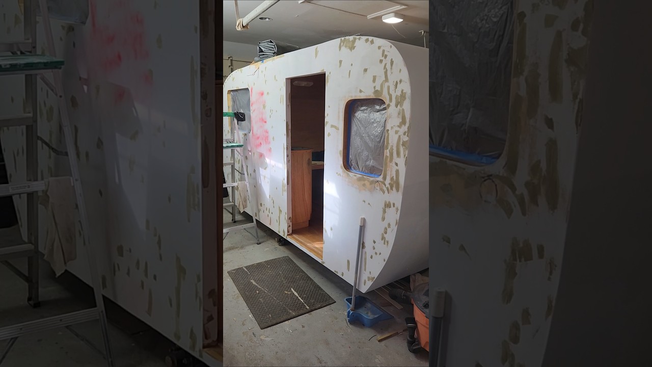 The lighter colored laun plywood is now encased in fiberglass and epoxy, time to start on paint