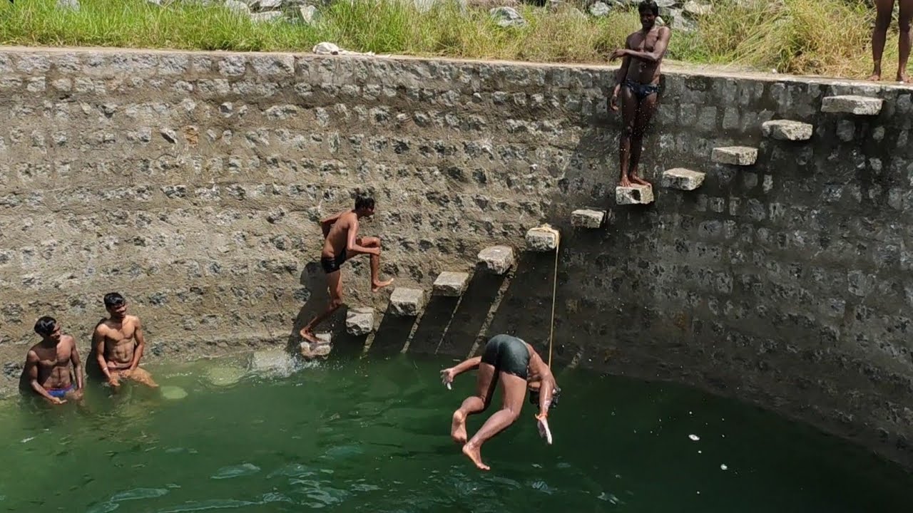 Swimming in deep well/ dive in deep well/ village boys life/summer special