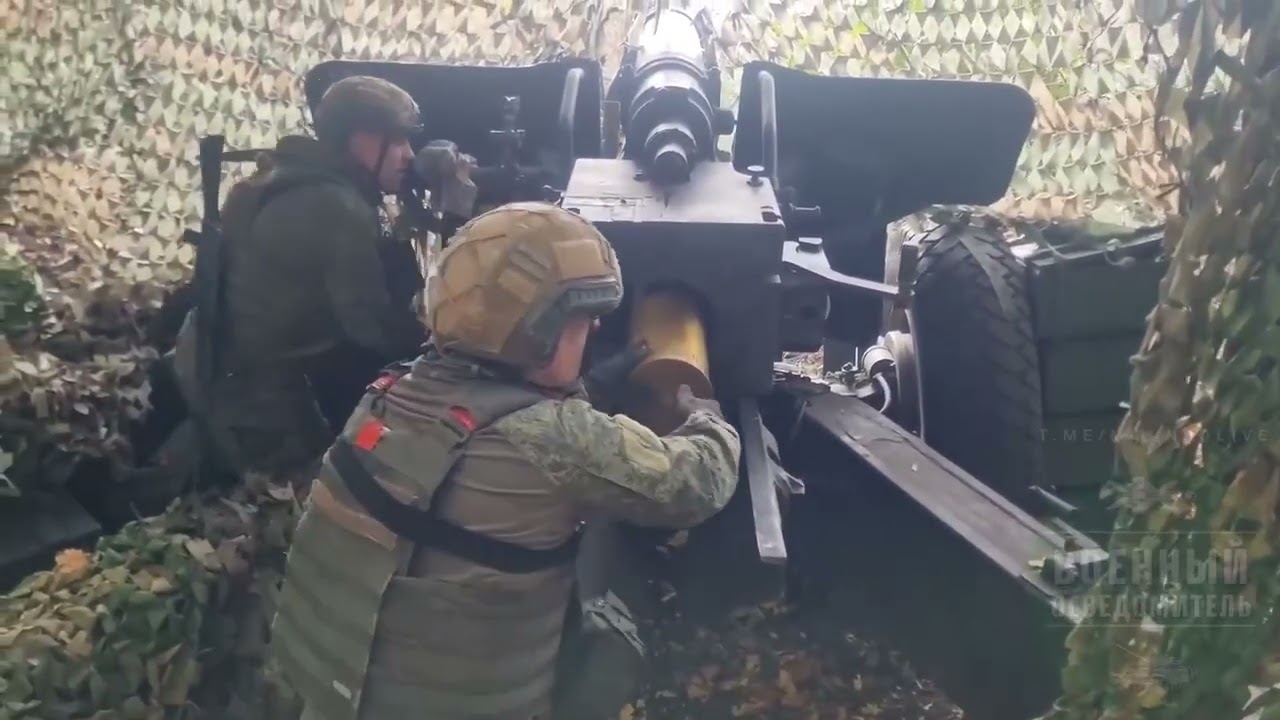 A crew of a 130-mm towed gun M-46 of the 44th Army Corps of the North group of forces fires