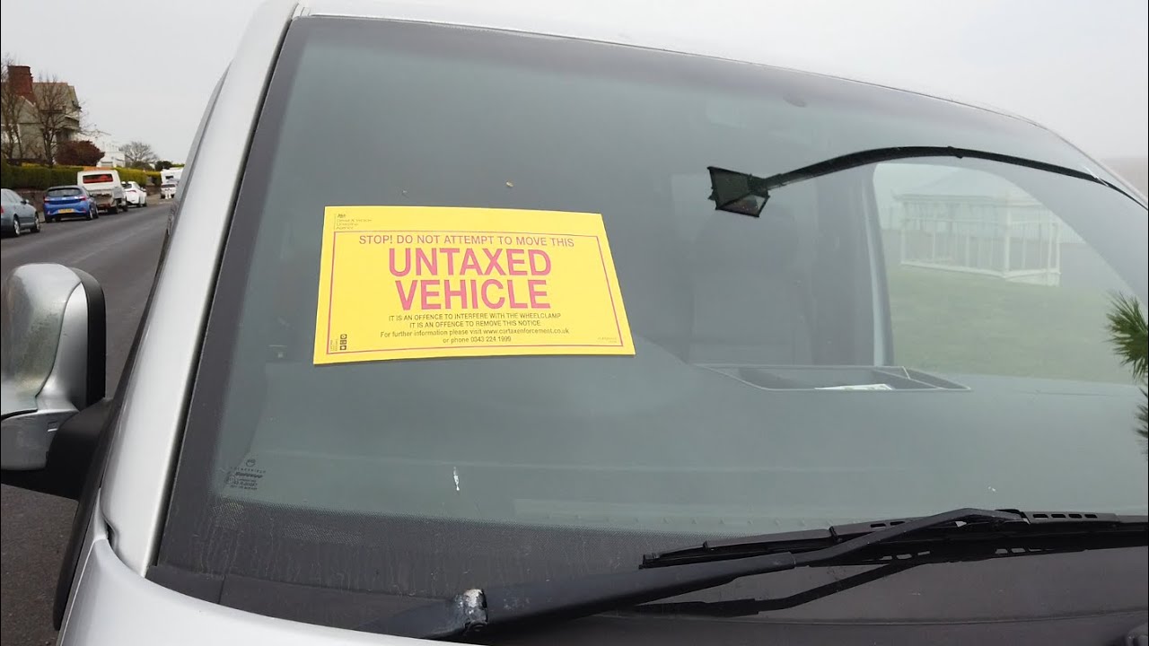TWO STICKERS - Road Tax Clamped